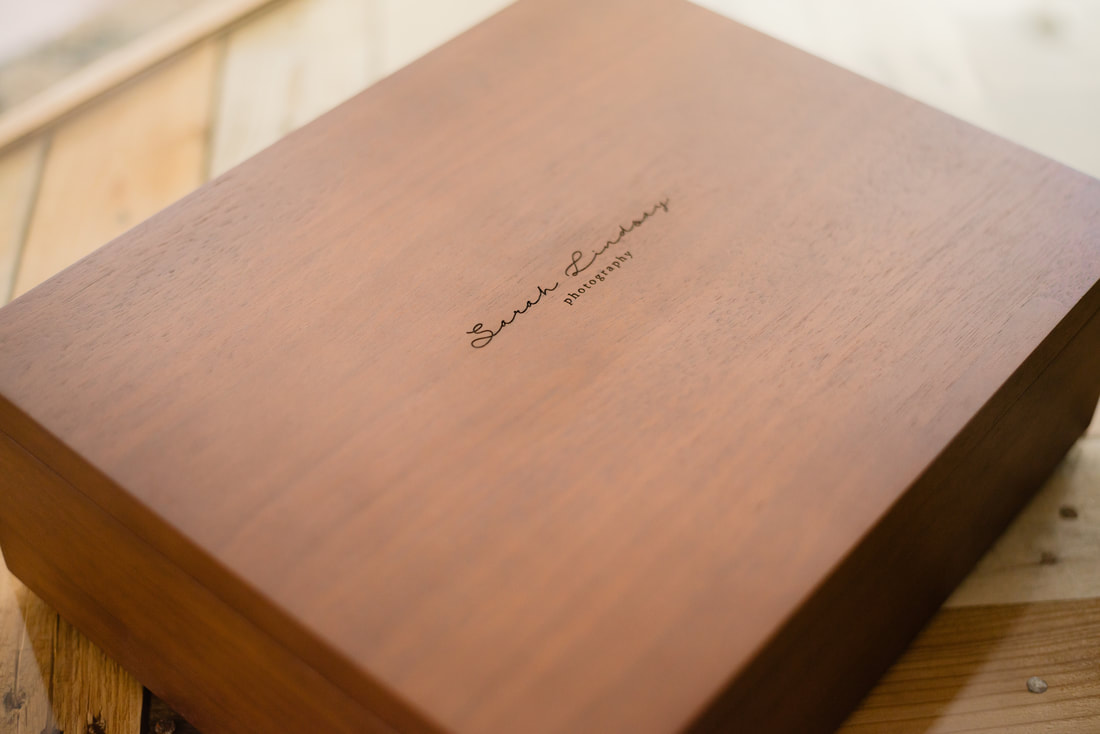 Brown box with Sarah Lindsay Photography Written on it 